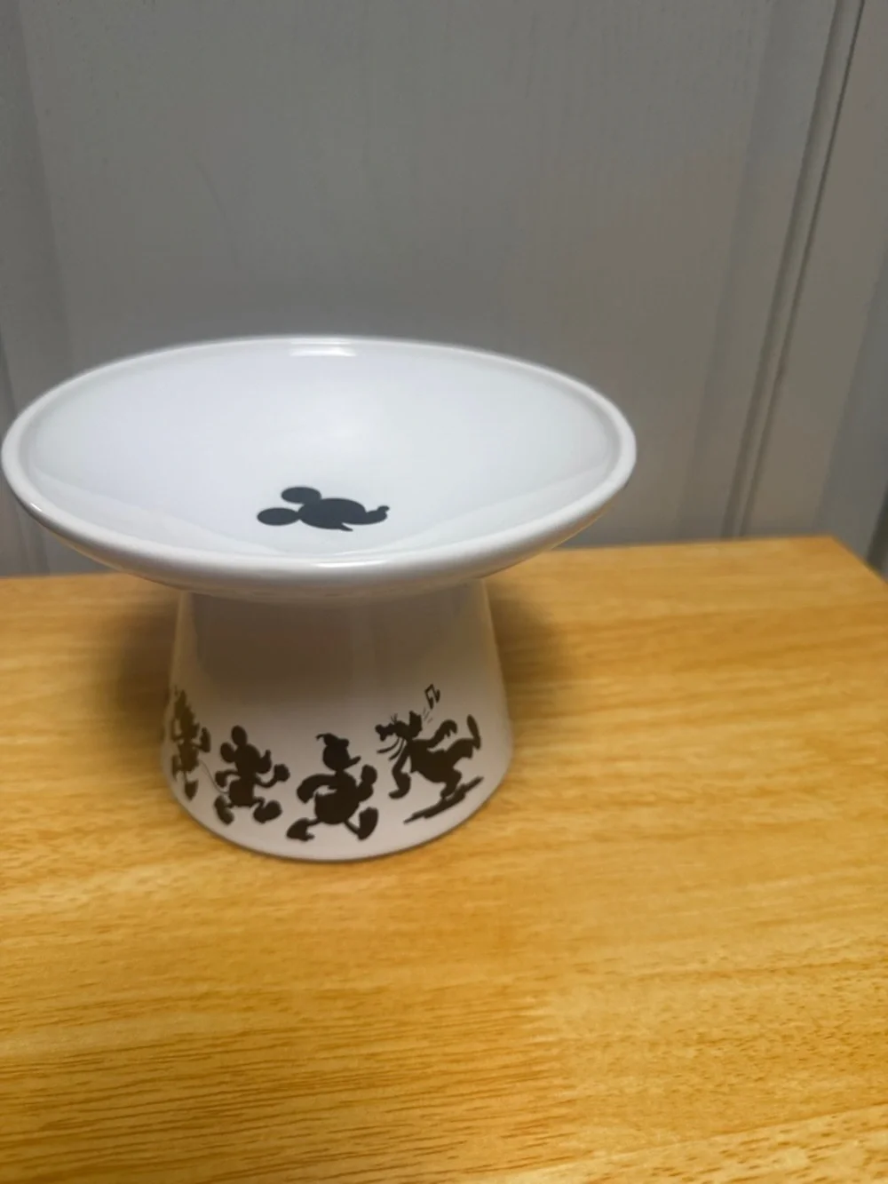 Disney White Ceramic Pet Pedestal Bowl with Black Character Silhouettes
